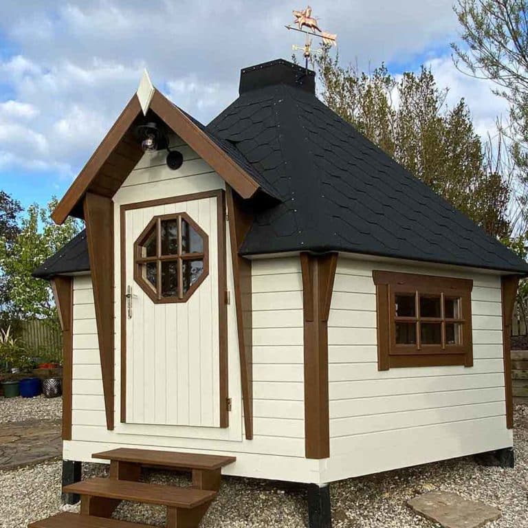 Thorndown-Dulcote-Stone-and-Hazel-Wood-Paint-with-White-SBP-on-Logspan-building_sq