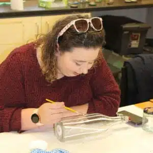 Glass-bottle-painting-with-Thorndown-Peelable-Glass-Paint
