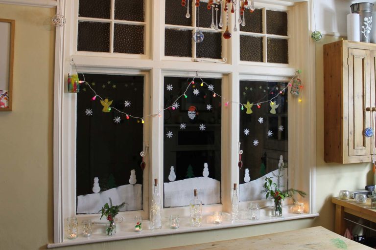 Christmas-window-painted-with-Thorndown-Peelable-Glass-Paint-Christmas-Stencil-Craft-Pack