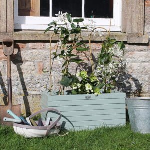 Thorndown-Old-Sage-Green-Wood-Paint-on-Planter-with-Cow-Parsley-White-and-Ottery-Brown-trug