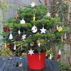 Christmas-Tree-with-wood-Christmas-decorations-painted-in-Thorndown-Swan-White-Rowan-Berry-Red-Golden-Somer-and-Yew-Gree-Wood-Paint