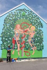 Frank-Harwood-painting-Adam-and-Eve-Glastonbury-Mural-Trail-with-Thorndown-Wood-Paint