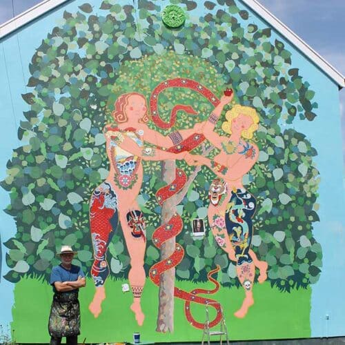 Frank-Harwood-painting-Adam-and-Eve-Glastonbury-Mural-Trail-with-Thorndown-Wood-Paint