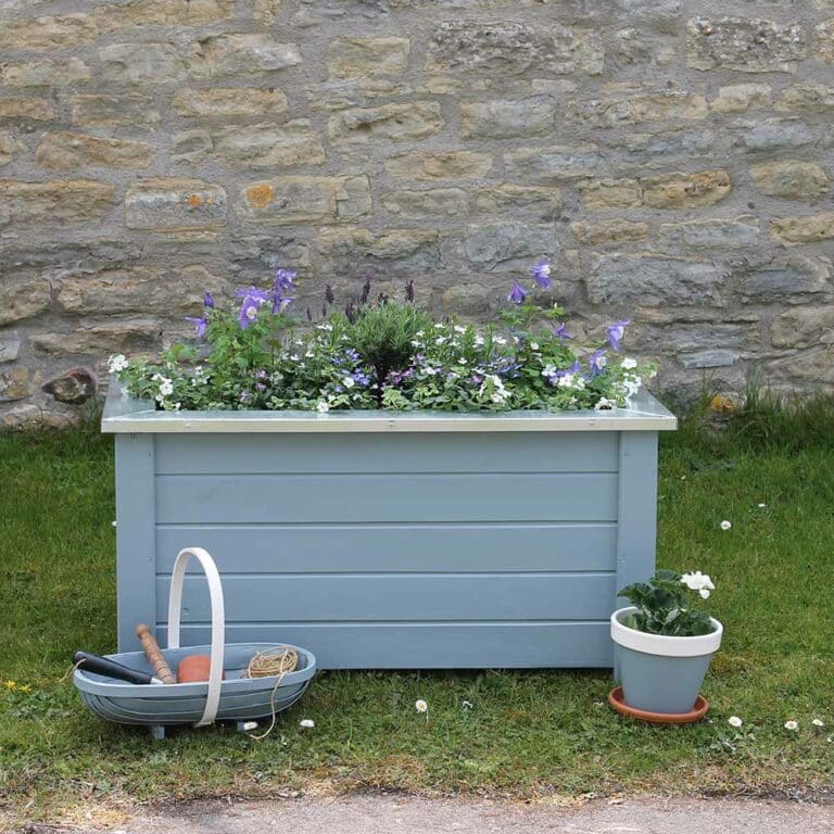 Thorndown-Axe-Blue-Wood-Paint-on-Forest-Cambridge-Planter_trug-and-terracotta-pot-with-Whey-White-rim_s