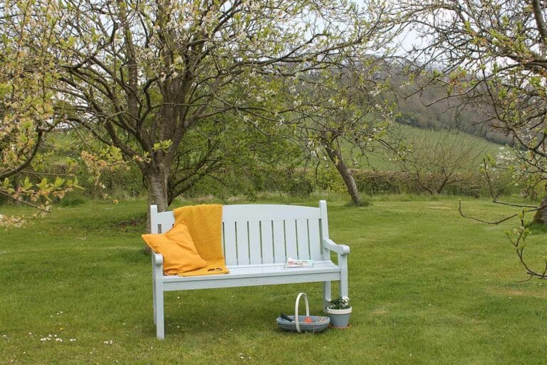 Thorndown-Greylake-Wood-Paint-on-Hutton-Cotswold-bench-with-Axe-Blue-trug-and-terracotta-pot_c