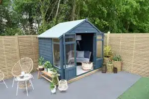 Thorndown-Cavepool-Grey-and-Bishop-Blue-Wood-Paint-on-Forest-Oakley-Summerhouse