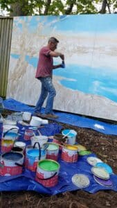 Jon-Minshull-painting-mural-background-with-Thorndown-Wood-Paint_Love-Your-Garden-Taunton4