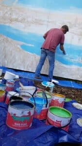 Jon-Minshull-painting-mural-background-with-Thorndown-Wood-Paint_Love-Your-Garden-Taunton7