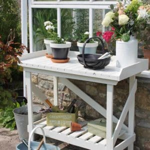 Thorndown-Whey-White-Wood-Paint-on-Forest-Potting-Bench-with-trugs-and-pots_sq