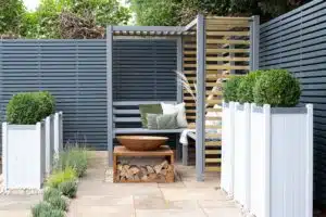 Thorndown-RAL-7037-Dusty-Grey-Wood-Paint-on-Firenze-Corner-Arbour-and-Greymond-on-Slender-Planters_1