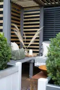 Thorndown-RAL-7037-Dusty-Grey-Wood-Paint-on-Firenze-Corner-Arbour-and-Greymond-on-Slender-Planters_5