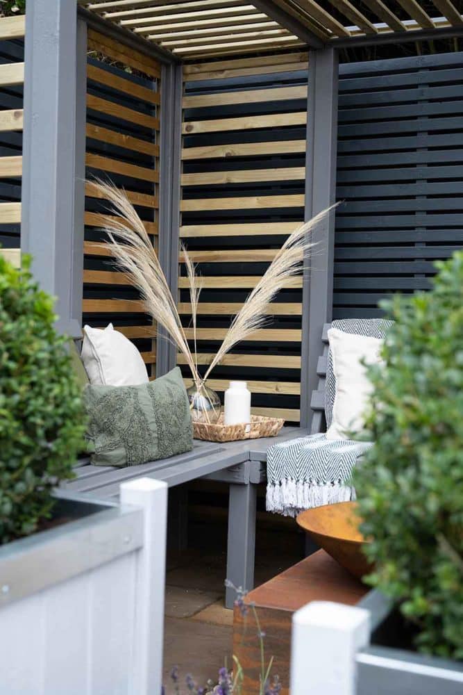 Thorndown-RAL-7037-Dusty-Grey-Wood-Paint-on-Firenze-Corner-Arbour-and-Greymond-on-Slender-Planters_5