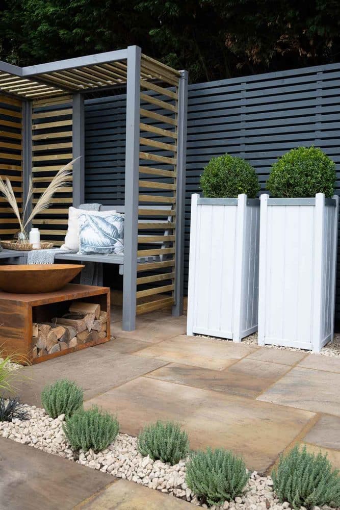 Thorndown-RAL-7037-Dusty-Grey-Wood-Paint-on-Firenze-Corner-Arbour-and-Greymond-on-Slender-Planters_6