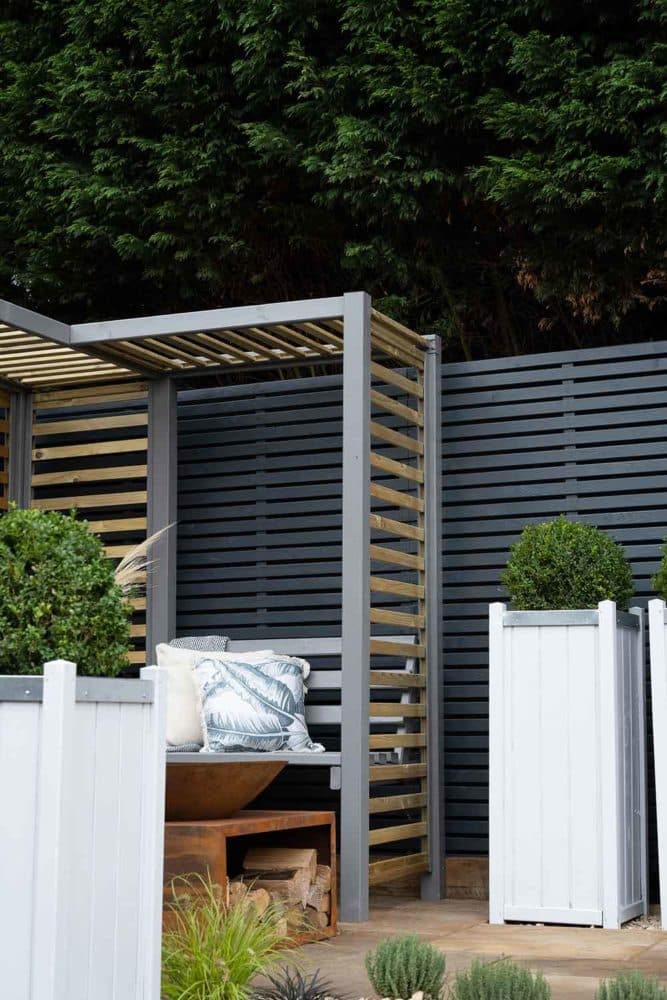 Thorndown-RAL-7037-Dusty-Grey-Wood-Paint-on-Firenze-Corner-Arbour-and-Greymond-on-Slender-Planters_7