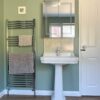 Thorndown-Goddess-Green-Wall-Paint-with-Swan-White-Wood-Paint_En-suite_2